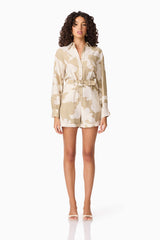 CURAAE Wisteria Long Sleeve Jumpsuit in White & Beige