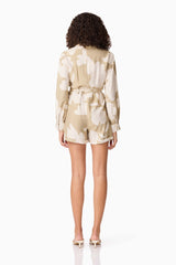 CURAAE Wisteria Long Sleeve Jumpsuit in White & Beige